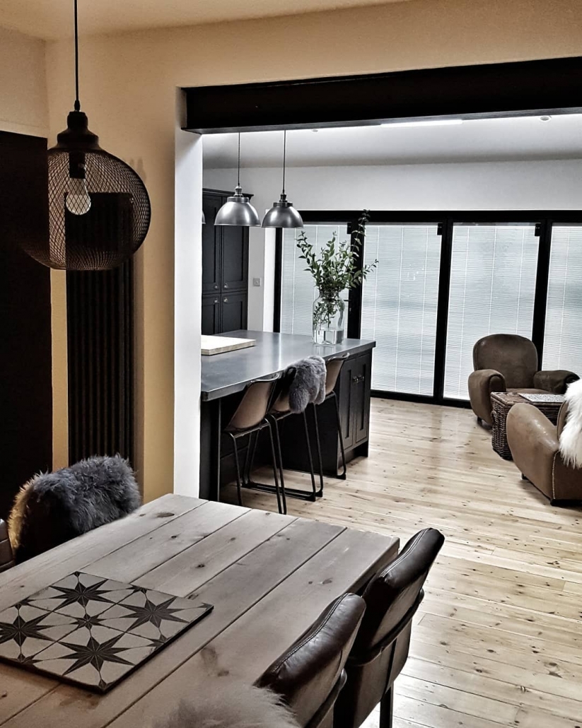 52630396_2006792509615748_4252522390897503105_n - Copy Milano Windsor Anthracite Vertical Radiator in a modern dining room.