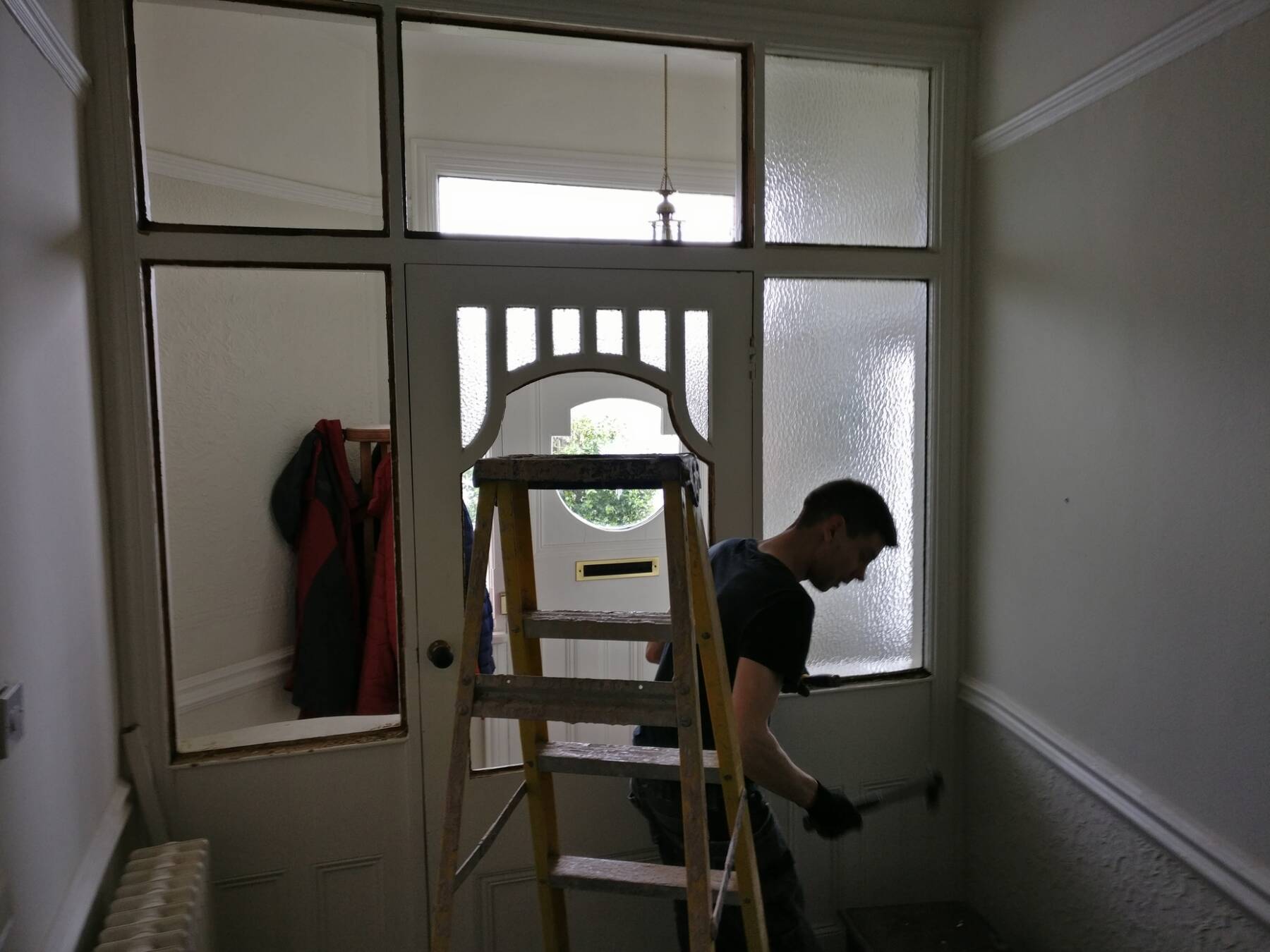 Webp.net-resizeimage (15) man decorating in a house